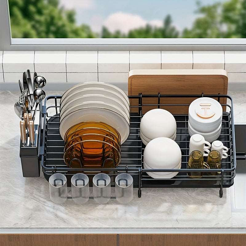 A Retractable Metal Bowl And Plate Rack for The Kitchen Countertop, Designed for Draining And Drying Dishes. This Expandable Storage Rack Fits Beside The Kitchen Sink And Includes a Cutting Board Holder, Cutlery Holder, And Cup Holder